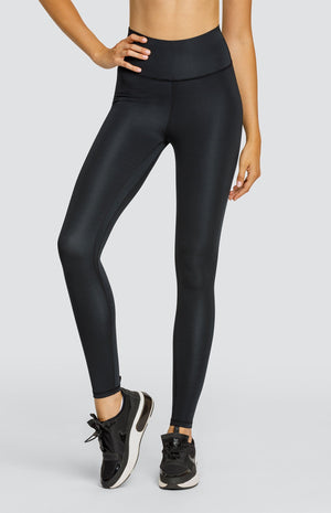 Model wearing black high waisted leggings.