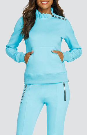 Model is wearing a Light Blue pullover with a side zipper at the collar and kangaroo pocket. Paired with matching Light Blue joggers. 