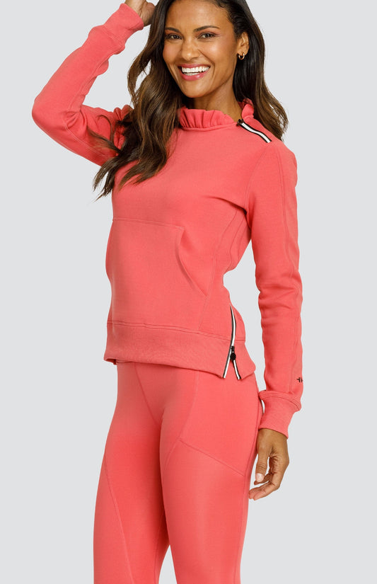 Model is wearing a Cherry Rose colored pullover with a side zipper collar and kangaroo pocket.