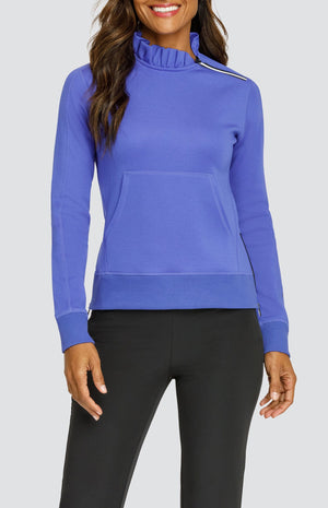 Model is wearing a Dark Blue pullover with side zipper at the collar and kangaroo pocket. Paired with Onyx Allure Ankle Pants. 