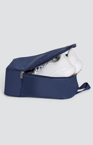 100% Nylon Shoe Bag with Handle, with zippered opening, Tail logo on front.