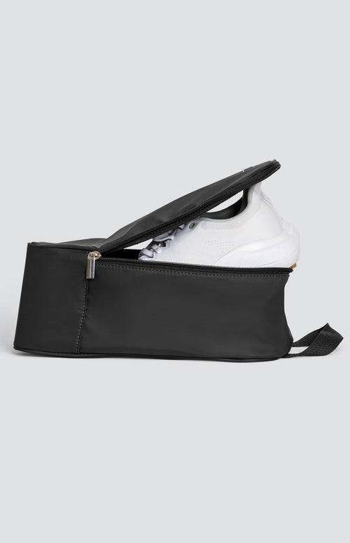 100% Nylon Shoe Bag with Handle, with zippered opening, Tail logo on front.