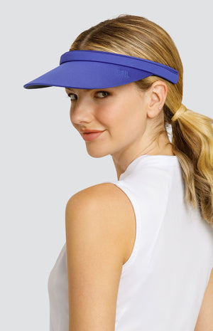 Model wearing a solid blue backless visor.