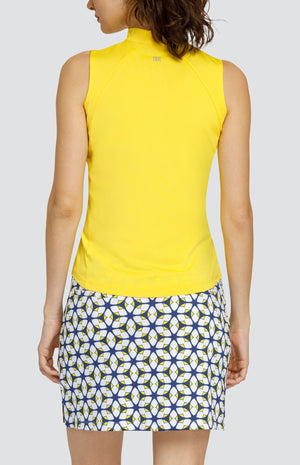 Model wearing a Dandelion yellow sleeveless top in performance jersey fabric with raised collar and curved hem. 